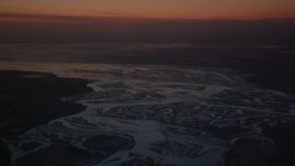 4K aerial stock footage the snow covered Knik River Valley, Alaska, twilight Aerial Stock Footage | AK0001_1143
