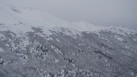 4K aerial stock footage snowy Chugach Mountain slopes, Alaska Aerial Stock Footage | AK0001_1184