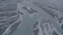 4K aerial stock footage flying over Knik River in snow covered Knik River Valley, Alaska Aerial Stock Footage | AK0001_1216