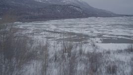 4K aerial stock footage flying over the snow covered Knik River Valley, Alaska Aerial Stock Footage | AK0001_1253