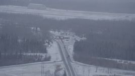 4K aerial stock footage a checkpoint on D Street near Bryant Army Heliport in snow, Anchorage, Alaska Aerial Stock Footage | AK0001_1319