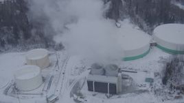 4K aerial stock footage a snow covered power plant, Anchorage, Alaska Aerial Stock Footage | AK0001_1322