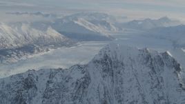 4K aerial stock footage flying toward snowy ridge, Knik Glacier, Chugach Mountains, Alaska Aerial Stock Footage | AK0001_1375