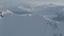 4K aerial stock footage flying over snowy ridge toward the Knik Glacier, Alaska Aerial Stock Footage | AK0001_1377
