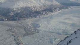 4K aerial stock footage Knik River Valley, Knik Glacier, Chugach Mountains, Alaska in snow Aerial Stock Footage | AK0001_1380