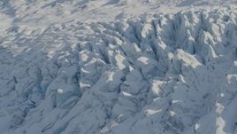 4K aerial stock footage the surface of the snow covered Knik Glacier, Alaska Aerial Stock Footage | AK0001_1395