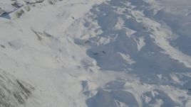 4K aerial stock footage the snowy ridge along edge of Knik Glacier, Alaska Aerial Stock Footage | AK0001_1400
