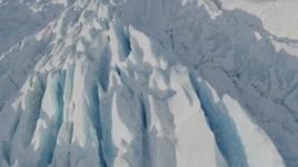 4K aerial stock footage the jagged, snow covered surface of the Knik Glacier, Alaska Aerial Stock Footage | AK0001_1421