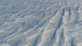 4K aerial stock footage the ridged, snow covered surface of the Knik Glacier, Alaska Aerial Stock Footage | AK0001_1424