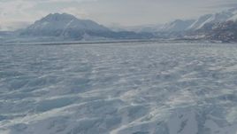 4K aerial stock footage flying over snow covered surface of Knik Glacier, Alaska Aerial Stock Footage | AK0001_1427