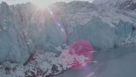 4K aerial stock footage the edge of a snow covered glacier on Inner Lake George, Alaska Aerial Stock Footage | AK0001_1450