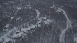 4K aerial stock footage snow covered residential neighborhoods in Chugiak, Alaska Aerial Stock Footage | AK0001_1623
