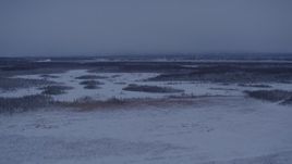 4K aerial stock footage Downtown Anchorage seen from snowy Point MacKenzie at twilight, Alaska Aerial Stock Footage | AK0001_1677