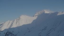 4K aerial stock footage flying by snowy slopes of the Chugach Mountains, Alaska Aerial Stock Footage | AK0001_1744