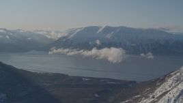 4K aerial stock footage snowy Kenai Mountains across from Turnagain Arm of the Cook Inlet, Alaska Aerial Stock Footage | AK0001_1746