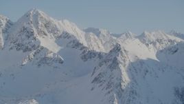 4K aerial stock footage snow covered sharp ranges and peaks in the Chugach Mountains, Alaska Aerial Stock Footage | AK0001_1752