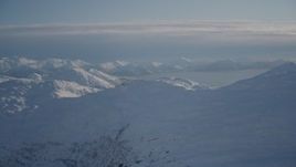 4K aerial stock footage Port Wells beyond a range of snow covered Chugach Mountains, Alaska Aerial Stock Footage | AK0001_1784