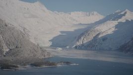 4K aerial stock footage snowy glacier spilling down Chugach Mountains into Harriman Fjord, Alaska Aerial Stock Footage | AK0001_1790