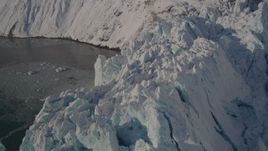 4K aerial stock footage the jagged edge of a snow covered glacier, Harriman Fjord, Alaska Aerial Stock Footage | AK0001_1800