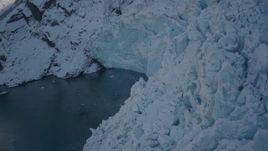 4K aerial stock footage the edge of a snow covered glacier on Harriman Fjord, Alaska Aerial Stock Footage | AK0001_1823