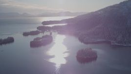 4K aerial stock footage snow covered islands at mouth of Hummer Bay, Port Wells, Alaska Aerial Stock Footage | AK0001_1873