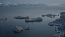 4K aerial stock footage small, snowy islands at mouth of Hummer Bay, Port Wells, Alaska Aerial Stock Footage | AK0001_1874