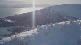 4K aerial stock footage pan across a snowy mountain ridge of the Chugach Mountains, Port Wells, Alaska Aerial Stock Footage | AK0001_1877