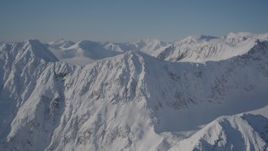 4K aerial stock footage flying toward a snowy mountain range in Chugach Mountains, Alaska Aerial Stock Footage | AK0001_1935