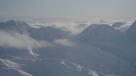 4K aerial stock footage snow covered mountain ranges in Chugach Mountains, Alaska Aerial Stock Footage | AK0001_1939