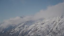 4K aerial stock footage windblown, snow covered Chugach Mountains, Alaska Aerial Stock Footage | AK0001_1971