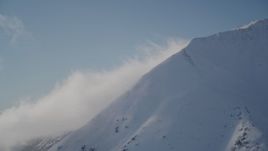4K aerial stock footage windblown, snow covered mountain slopes in Chugach Mountains, Alaska Aerial Stock Footage | AK0001_1972