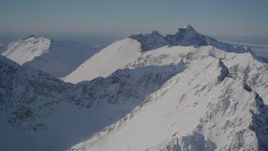 4K aerial stock footage flying over the snow covered Chugach Mountains, Alaska Aerial Stock Footage | AK0001_1987