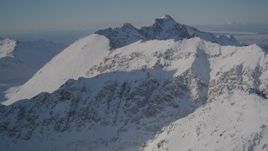 4K aerial stock footage flying over the snow covered Chugach Mountains, Alaska Aerial Stock Footage | AK0001_1988