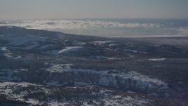 4K aerial stock footage rolling hills and forests near the Chugach Mountains, Alaska in snow Aerial Stock Footage | AK0001_2001
