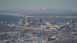 4K aerial stock footage flying toward snowy Downtown Anchorage, Knik Arm of the Cook Inlet, Alaska Aerial Stock Footage | AK0001_2012