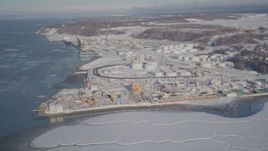 4K aerial stock footage a snow covered oil refinery next to the Port of Anchorage, Alaska Aerial Stock Footage | AK0001_2015
