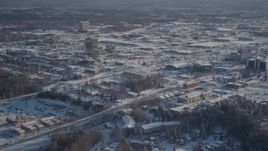 4K aerial stock footage panning across snow covered residential neighborhoods, Anchorage, Alaska Aerial Stock Footage | AK0001_2025