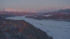 4K aerial stock footage snowy Matanuska River Valley, Chugach Mountains, Palmer, Alaska, twilight Aerial Stock Footage | AK0001_2097
