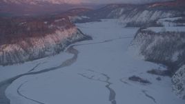 4K aerial stock footage snowy Matanuska River Valley, Chugach Mountains, Anchorage, Alaska, twilight Aerial Stock Footage | AK0001_2100
