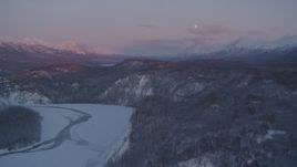 4K aerial stock footage snowy Matanuska River Valley, Chugach Mountains, Anchorage, Alaska, twilight Aerial Stock Footage | AK0001_2102