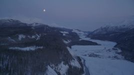 4K aerial stock footage snowy Matanuska River Valley, Talkeetna Mountains, Sutton, Alaska, twilight Aerial Stock Footage | AK0001_2119