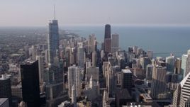 4.8K aerial stock footage flying over downtown toward Trump Tower Chicago and John Hancock Center, Downtown Chicago, Illinois Aerial Stock Footage | AX0001_027