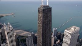 4.8K aerial stock footage tracking John Hancock Tower, tilt down Downtown Chicago, Illinois Aerial Stock Footage | AX0001_031