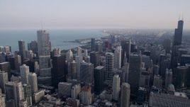4.8K aerial stock footage of Downtown Chicago skyscrapers on a hazy day, Illinois Aerial Stock Footage | AX0001_032