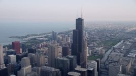 4.8K aeria video  tilt from the Chicago River to reveal Willis Tower in Downtown Chicago, Illinois Aerial Stock Footage | AX0001_033