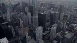 4.8K aerial stock footage tilting from Chicago River to reveal Trump Tower Chicago and Willis Tower in distance, Downtown Chicago, Illinois Aerial Stock Footage | AX0001_040