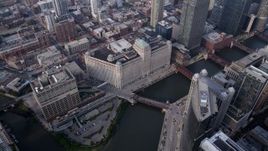 4.8K aerial stock footage pan from Merchandise Mart across the Chicago River, Downtown Chicago, Illinois Aerial Stock Footage | AX0001_046