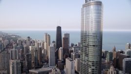 4.8K aerial stock footage flyby Trump Tower Chicago with a view across downtown at John Hancock Center, Downtown Chicago, Illinois Aerial Stock Footage | AX0001_049