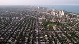 4.8K aerial stock footage video of neighborhoods and apartment buildings in North Chicago, on a hazy day, Illinois Aerial Stock Footage | AX0001_058
