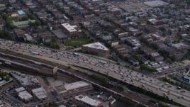 4.8K aerial stock footage pan across heavy traffic on Interstate 90 and 94, West Chicago, Illinois Aerial Stock Footage | AX0001_060
